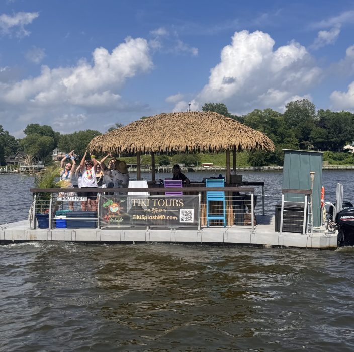 Tiki Splash's thatched-roof boat cruising on the North East River